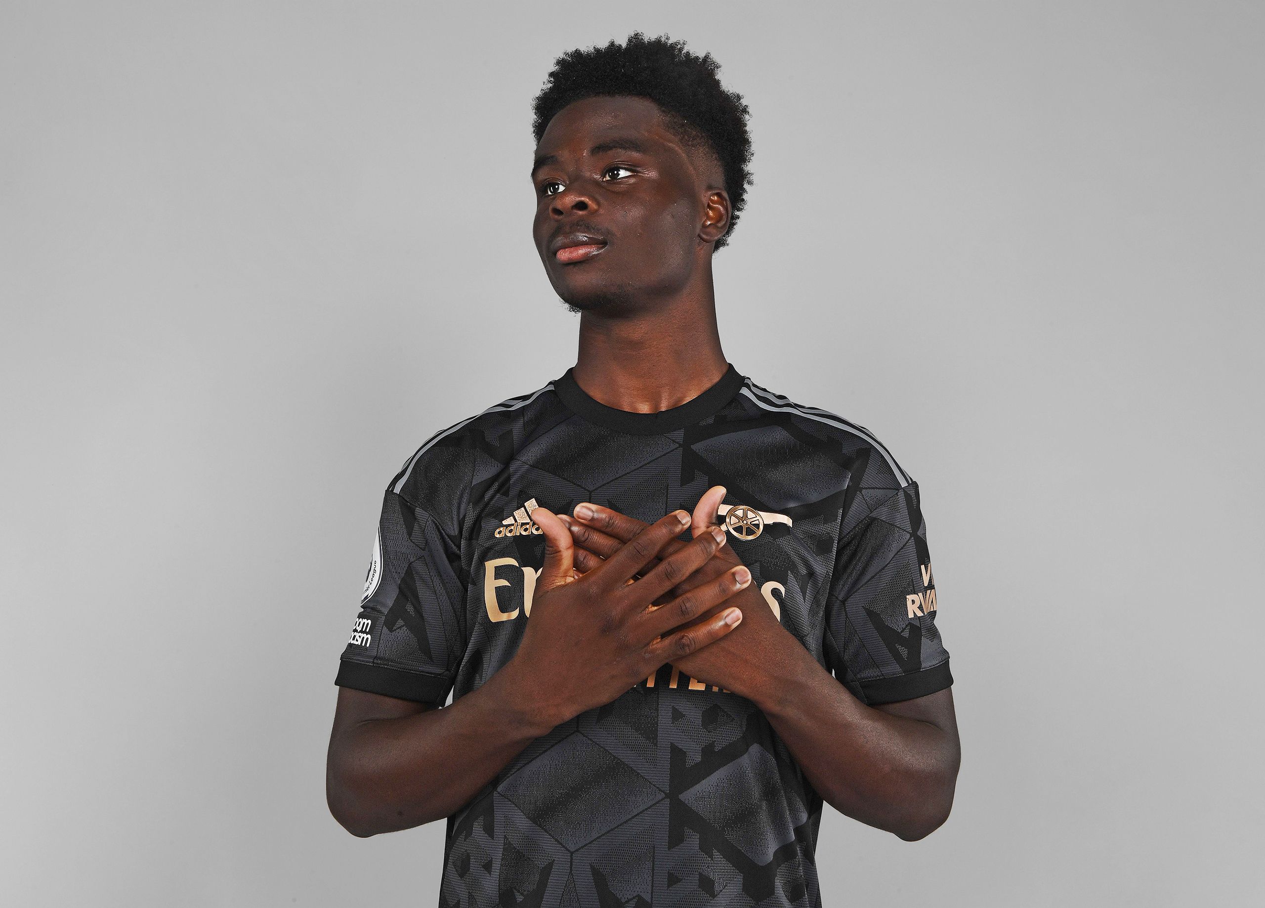 Bukayo Saka in the black away kit