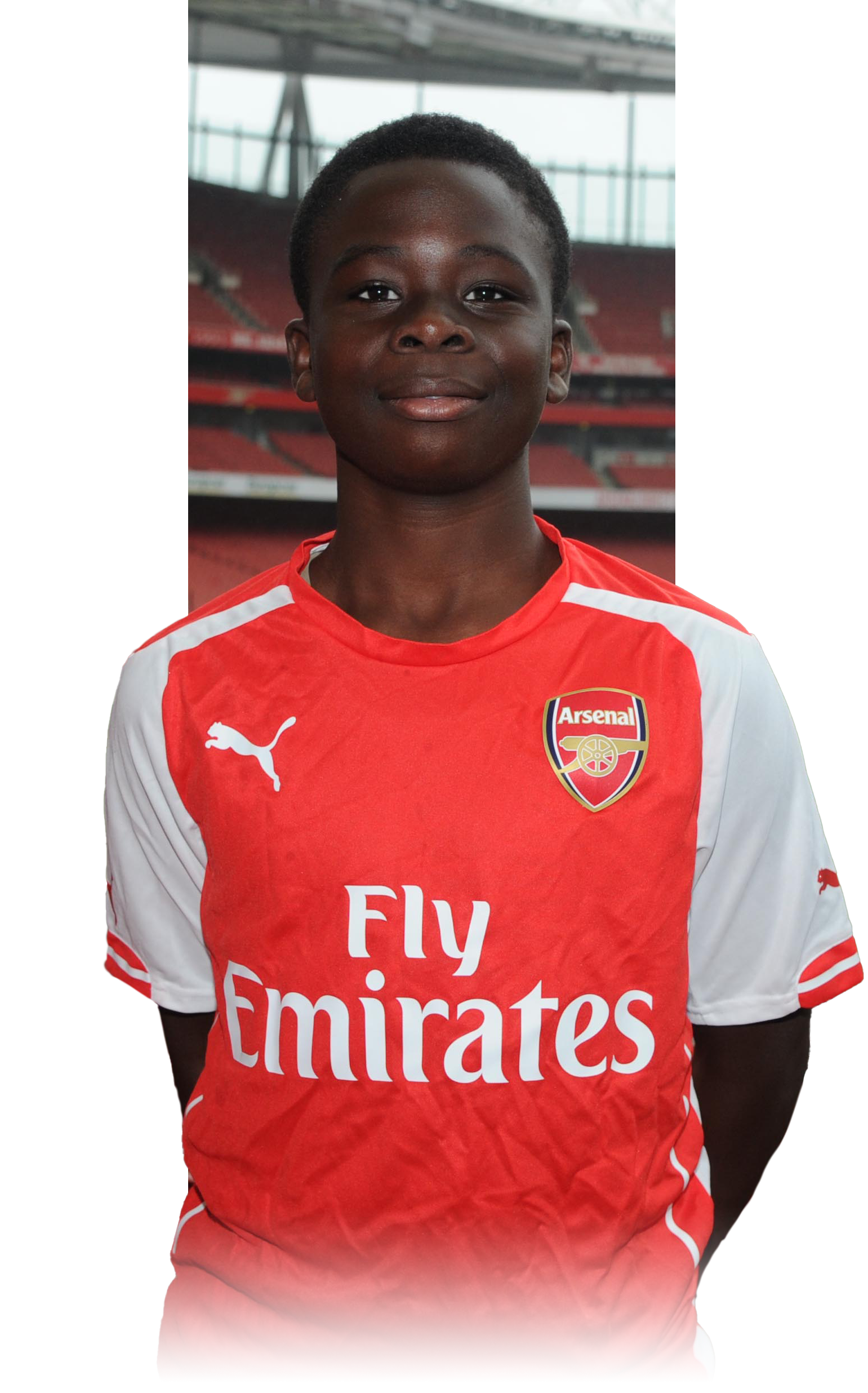 Bukayo Saka in home kit at Emirates Stadium in his early days at the academy