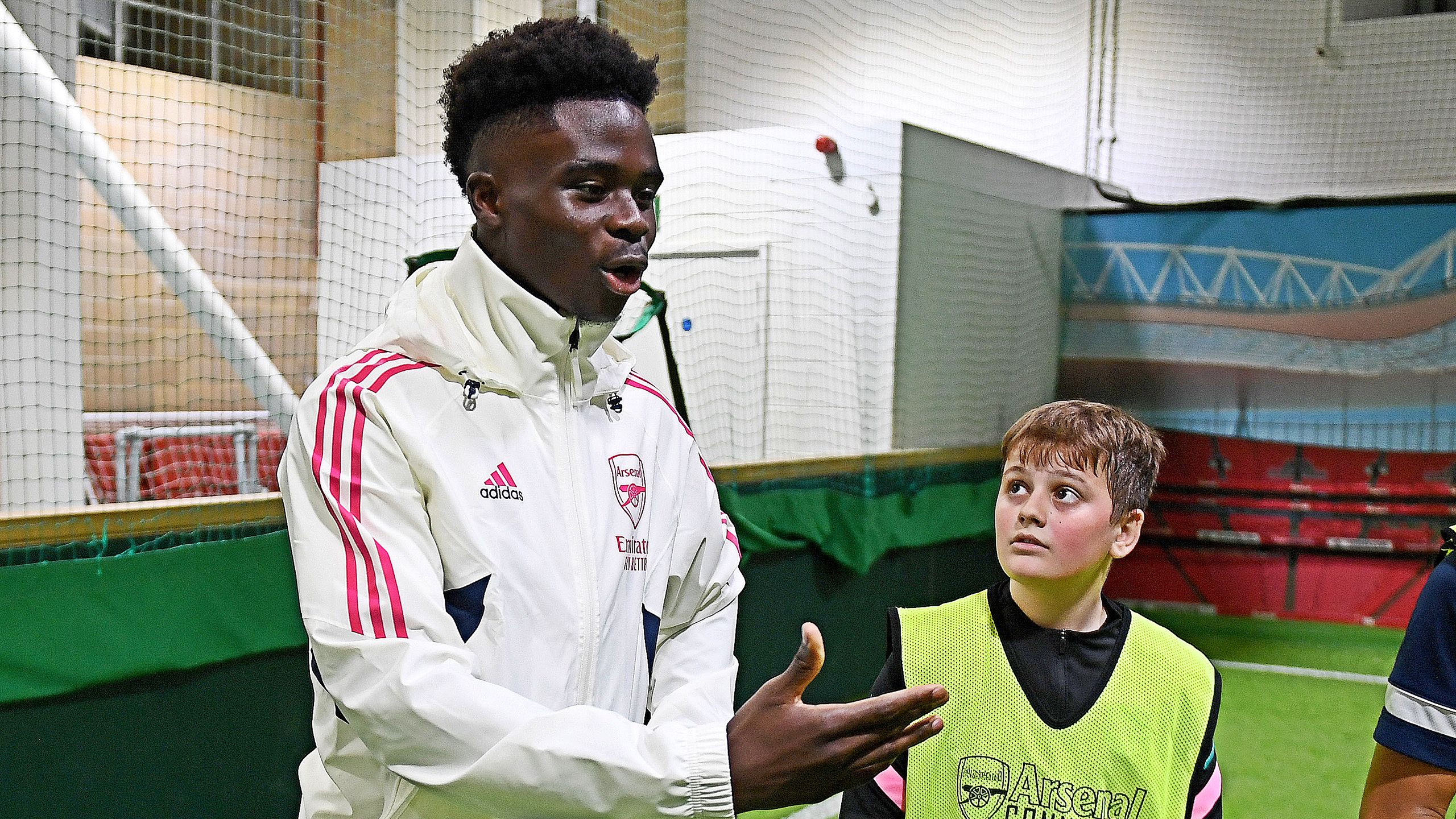 Bukayo Saka attends a community event at the Hub in north London