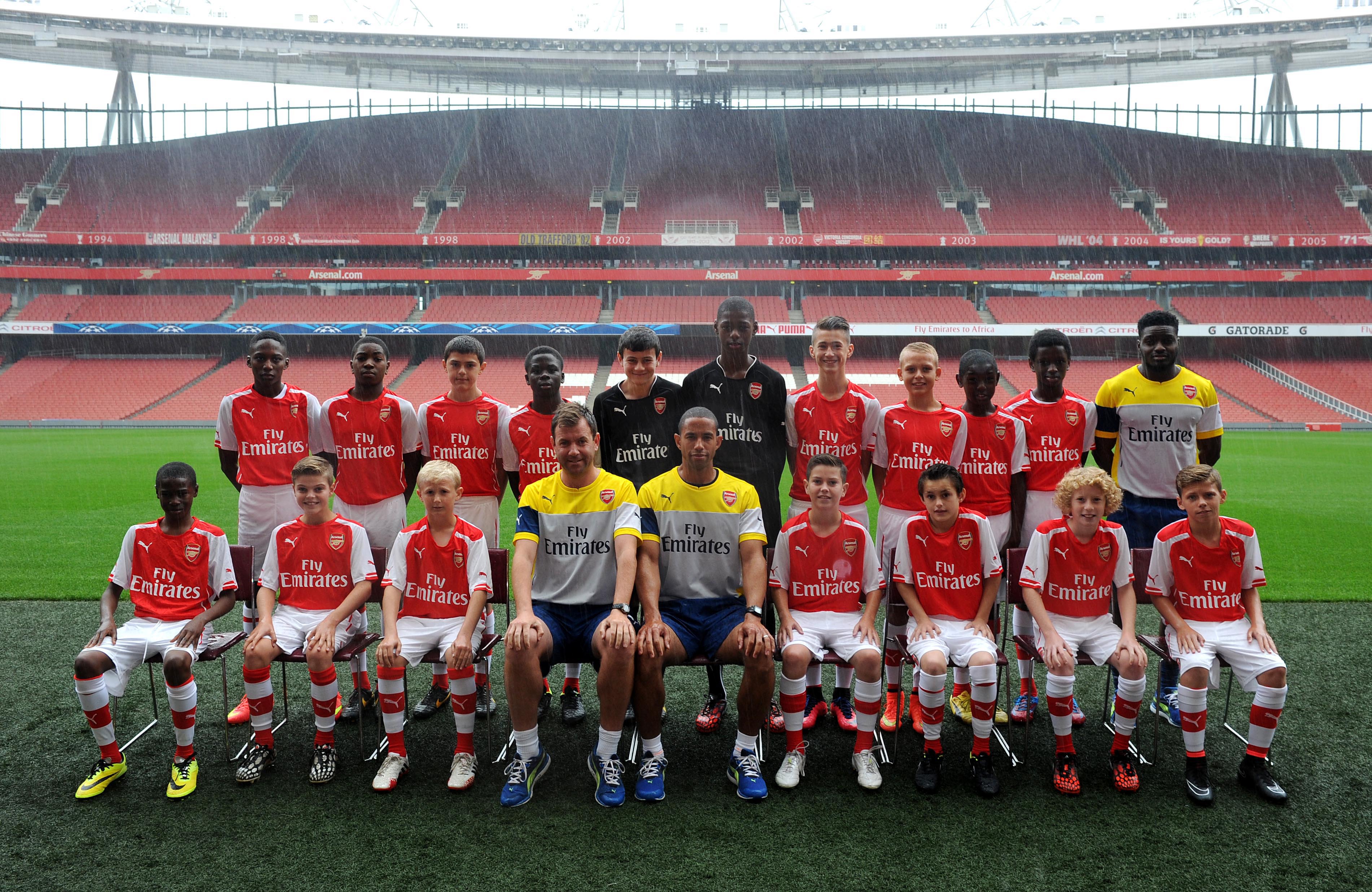 Bukayo Saka lines up with Arsenal Under-13s at Emirates Stadium